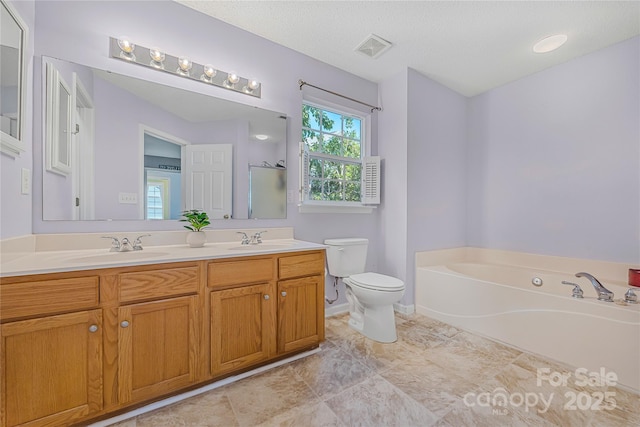 241 Chestnut Ave, Tega Cay, SC 29708 - bathroom with double vanity and a bath