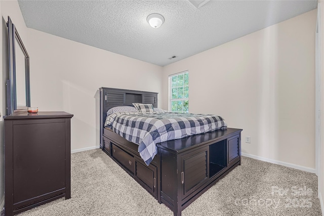 241 Chestnut Ave, Tega Cay, SC 29708 - bedroom with light colored carpet and a textured ceiling