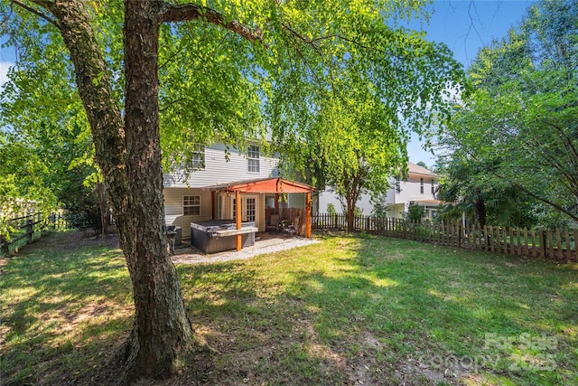 241 Chestnut Ave, Tega Cay, SC 29708 - fenced backyard featuring a hot tub and a patio