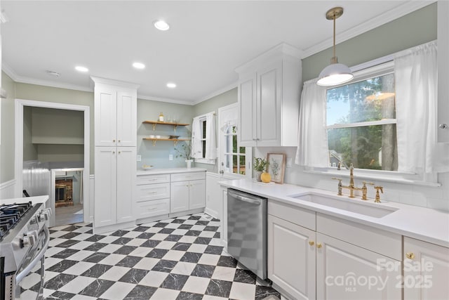 1024 Regency Dr, Charlotte, NC 28211 - kitchen with stainless steel appliances, plenty of natural light, white cabinetry, dark floors, and recessed lighting