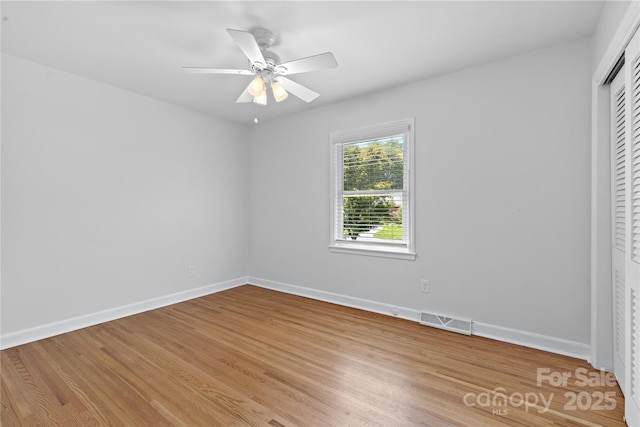 1024 Regency Dr, Charlotte, NC 28211 - unfurnished bedroom with a closet, light wood-type flooring, and ceiling fan