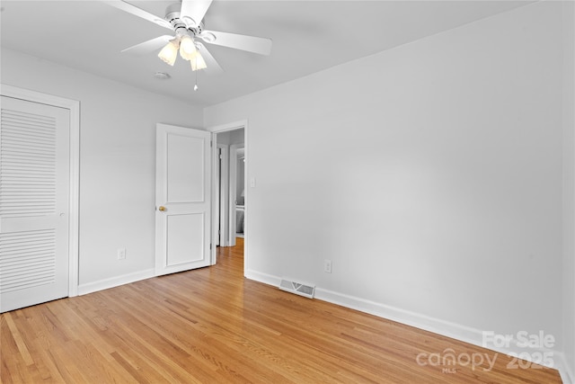 1024 Regency Dr, Charlotte, NC 28211 - unfurnished bedroom with light wood finished floors, ceiling fan, and a closet