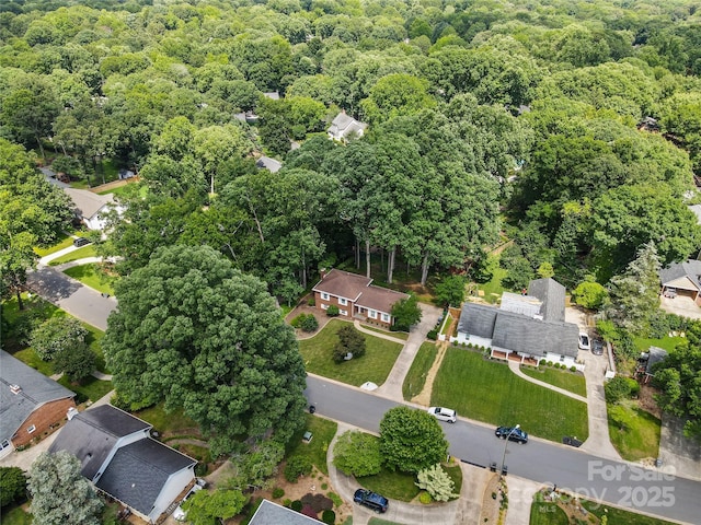 1024 Regency Dr, Charlotte, NC 28211 - aerial view of property and surrounding area featuring a heavily wooded area