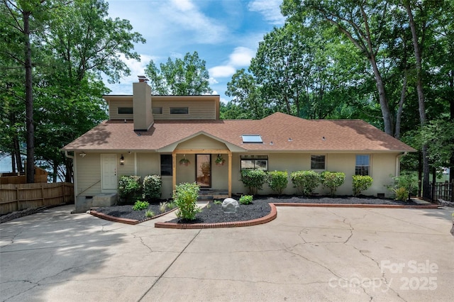 6259 River Cabin Ln, Charlotte, NC 28278 - view of front of house with a chimney and a shingled roof