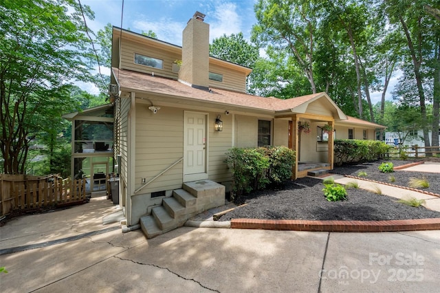 6259 River Cabin Ln, Charlotte, NC 28278 - view of front of home featuring a chimney and roof with shingles