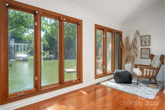 6259 River Cabin Ln, Charlotte, NC 28278 - doorway to outside featuring ornamental molding, wood finished floors, and a water view