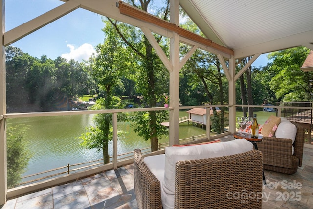 6259 River Cabin Ln, Charlotte, NC 28278 - sunroom / solarium featuring a water view, view of scattered trees, and vaulted ceiling