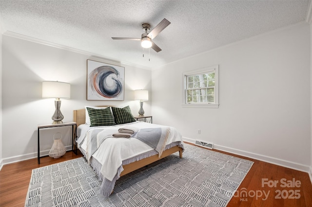 6259 River Cabin Ln, Charlotte, NC 28278 - bedroom featuring ornamental molding, wood finished floors, ceiling fan, and a textured ceiling