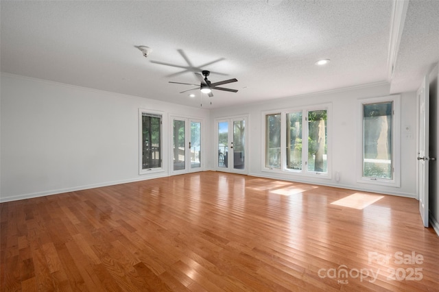 6259 River Cabin Ln, Charlotte, NC 28278 - unfurnished living room with a textured ceiling, a ceiling fan, crown molding, light wood-style floors, and recessed lighting