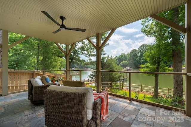 6259 River Cabin Ln, Charlotte, NC 28278 - view of patio / terrace featuring a water view, a ceiling fan, view of scattered trees, and outdoor lounge area