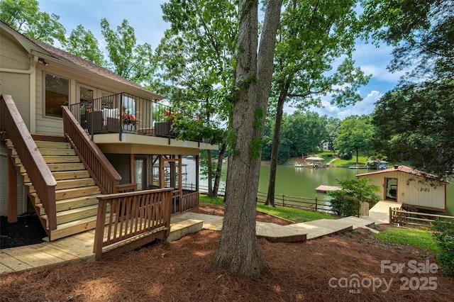 6259 River Cabin Ln, Charlotte, NC 28278 - view of yard with a deck with water view, stairway, and view of wooded area