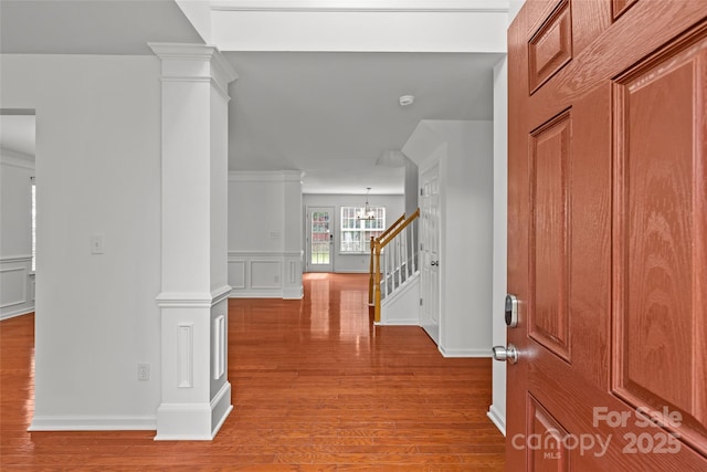 516 Cool Creek Dr, Rock Hill, SC 29732 - foyer featuring wood finished floors, a decorative wall, stairs, a chandelier, and a wainscoted wall