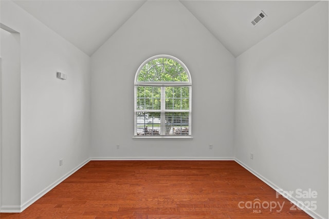 516 Cool Creek Dr, Rock Hill, SC 29732 - spare room featuring vaulted ceiling and wood finished floors