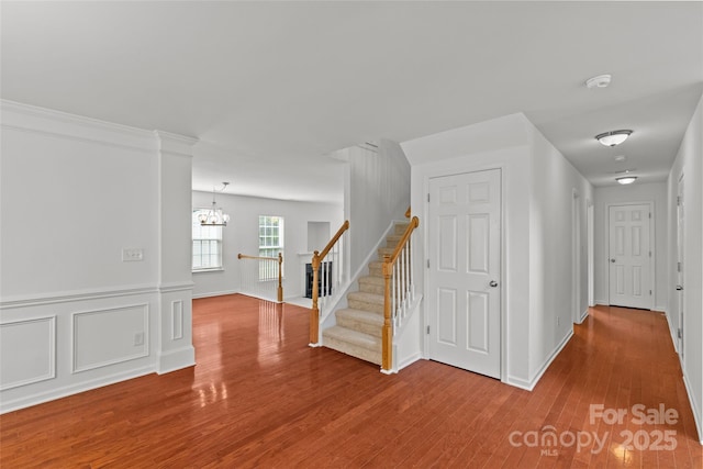 516 Cool Creek Dr, Rock Hill, SC 29732 - hallway featuring a chandelier, wood finished floors, and stairway