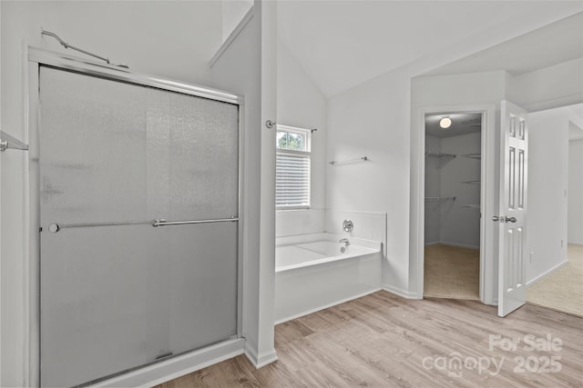 516 Cool Creek Dr, Rock Hill, SC 29732 - full bath featuring wood finished floors, lofted ceiling, a shower stall, a bath, and a spacious closet