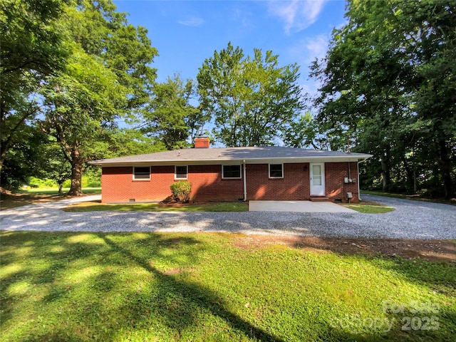 7812 Old Concord Rd, Salisbury, NC 28146 - view of front of property with a front yard, brick siding, and a chimney