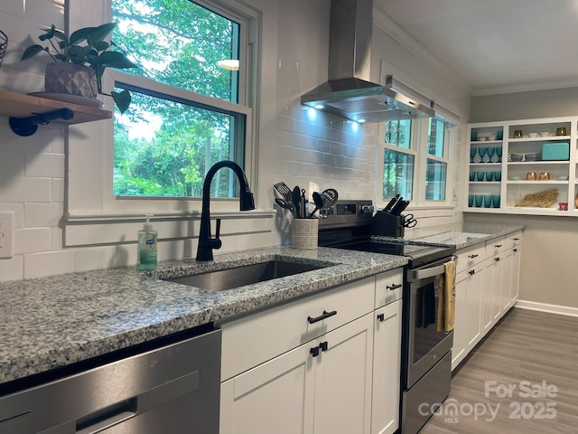 107 Byrd St, Morganton, NC 28655 - kitchen with stainless steel appliances, exhaust hood, crown molding, white cabinets, and light stone counters