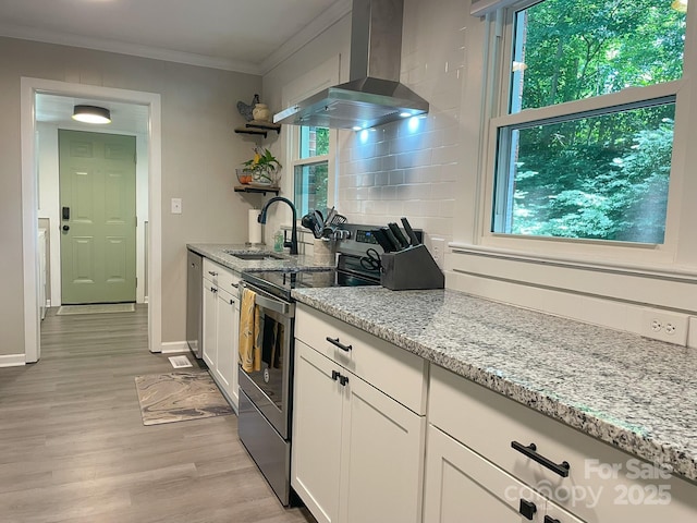 107 Byrd St, Morganton, NC 28655 - kitchen with wall chimney exhaust hood, electric stove, open shelves, plenty of natural light, and ornamental molding