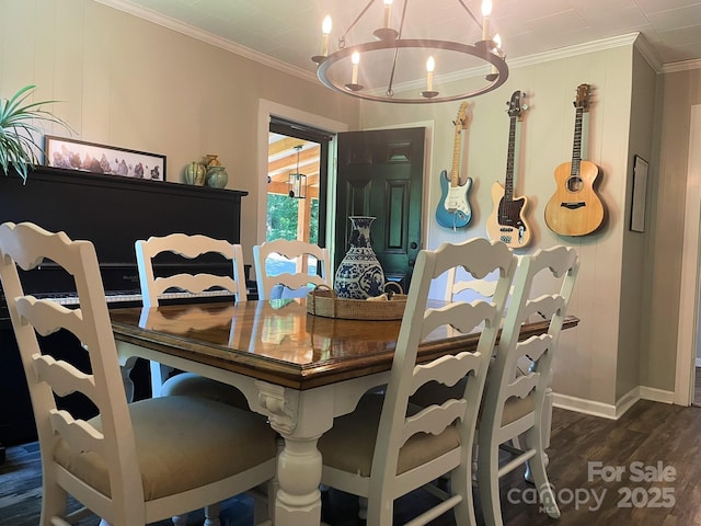 107 Byrd St, Morganton, NC 28655 - dining area with a chandelier, ornamental molding, and dark wood-style flooring