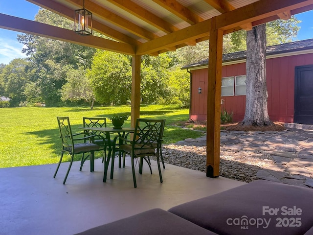 107 Byrd St, Morganton, NC 28655 - view of patio featuring outdoor dining area