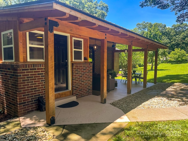 107 Byrd St, Morganton, NC 28655 - property entrance featuring brick siding and a yard
