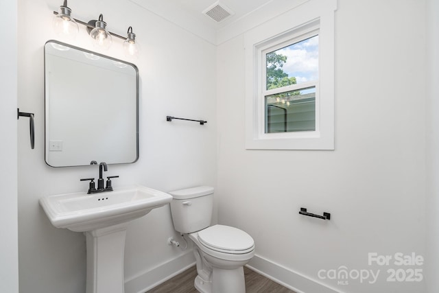 318 Sixth St, Belmont, NC 28012 - bathroom featuring baseboards and wood finished floors