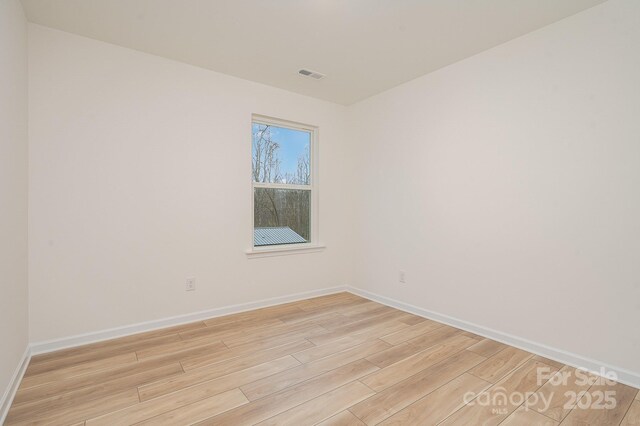 318 Sixth St, Belmont, NC 28012 - unfurnished room with light wood-style floors
