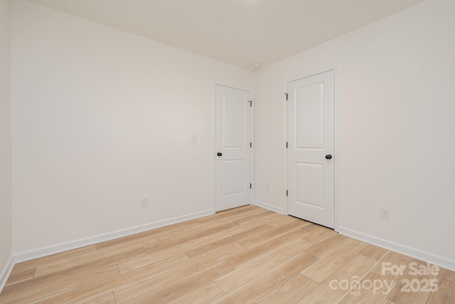 318 Sixth St, Belmont, NC 28012 - spare room with light wood-style flooring and baseboards