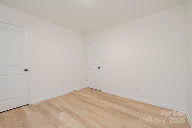 318 Sixth St, Belmont, NC 28012 - empty room with light wood finished floors