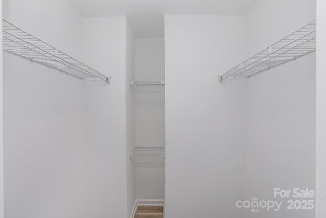 318 Sixth St, Belmont, NC 28012 - walk in closet with wood finished floors