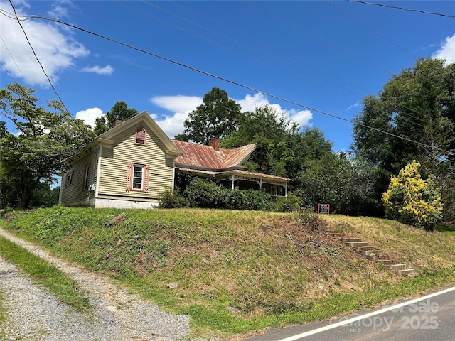 6268 Hudlow Rd, Union Mills, NC 28167 - view of front of house with a chimney