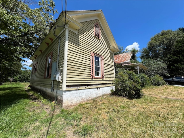 6268 Hudlow Rd, Union Mills, NC 28167 - view of home's exterior featuring a lawn