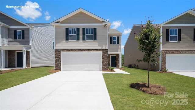 514 13th Avenue Dr NE, Hickory, NC 28601 - view of front of house featuring stone siding, concrete driveway, a garage, and a front lawn