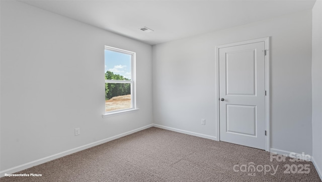 514 13th Avenue Dr NE, Hickory, NC 28601 - carpeted spare room with baseboards