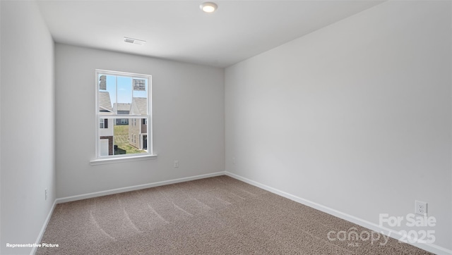 514 13th Avenue Dr NE, Hickory, NC 28601 - spare room featuring baseboards and carpet flooring