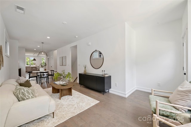 209 Coxe Ave Unit A, Charlotte, NC 28208 - living room with wood finished floors and recessed lighting
