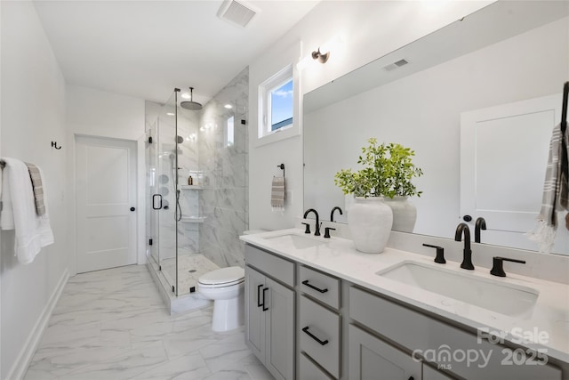 209 Coxe Ave Unit A, Charlotte, NC 28208 - bathroom featuring marble finish flooring, a marble finish shower, and double vanity