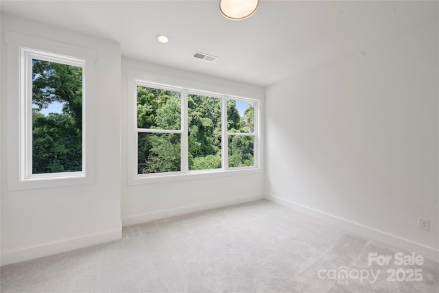 209 Coxe Ave Unit A, Charlotte, NC 28208 - unfurnished room with light carpet and recessed lighting