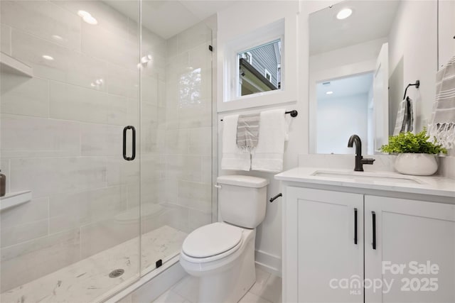 209 Coxe Ave Unit A, Charlotte, NC 28208 - bathroom with vanity, a shower stall, and recessed lighting