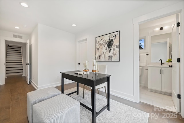 209 Coxe Ave Unit A, Charlotte, NC 28208 - home office featuring recessed lighting and wood finished floors