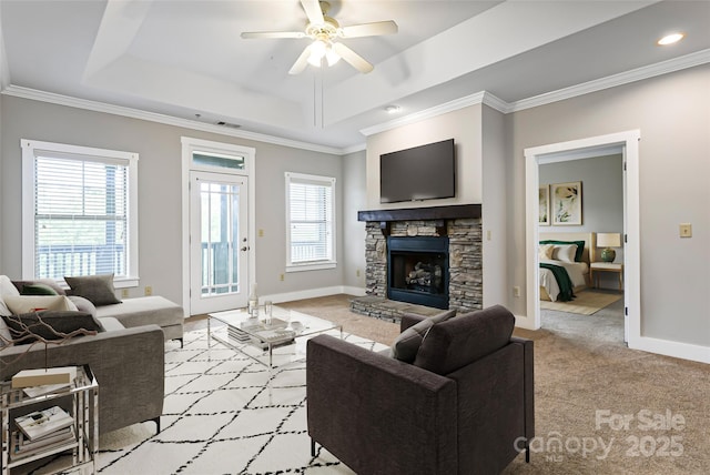 9 Kenilworth Knl, Asheville, NC 28805 - living area with a raised ceiling, light carpet, a ceiling fan, a fireplace, and ornamental molding