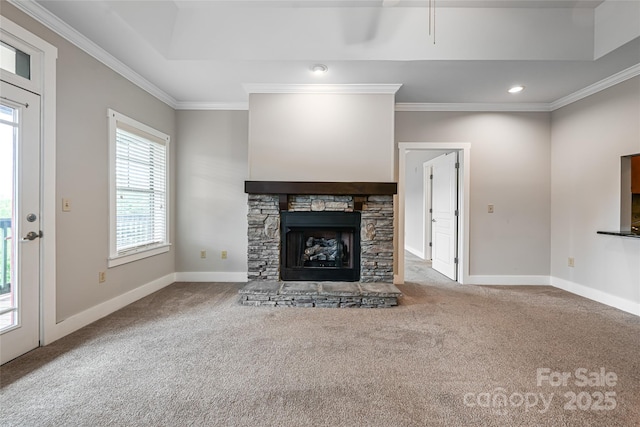 9 Kenilworth Knl, Asheville, NC 28805 - unfurnished living room featuring carpet flooring, ornamental molding, a stone fireplace, and recessed lighting
