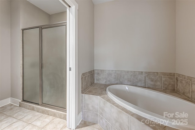 9 Kenilworth Knl, Asheville, NC 28805 - full bathroom with a shower stall, a garden tub, and tile patterned floors