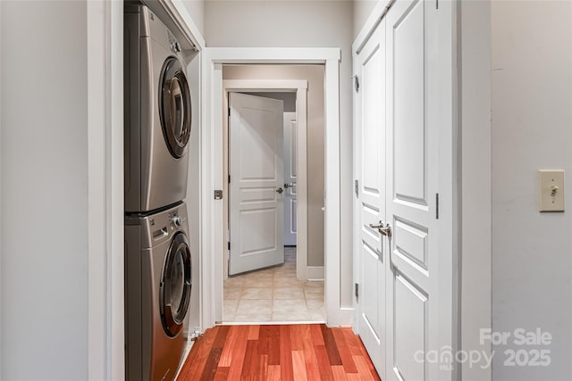 9 Kenilworth Knl, Asheville, NC 28805 - laundry area with stacked washer / drying machine and wood finished floors