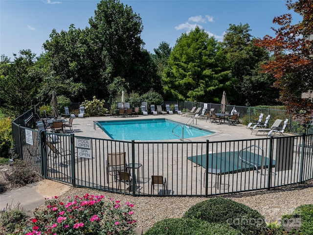 9 Kenilworth Knl, Asheville, NC 28805 - community pool featuring a patio and view of scattered trees