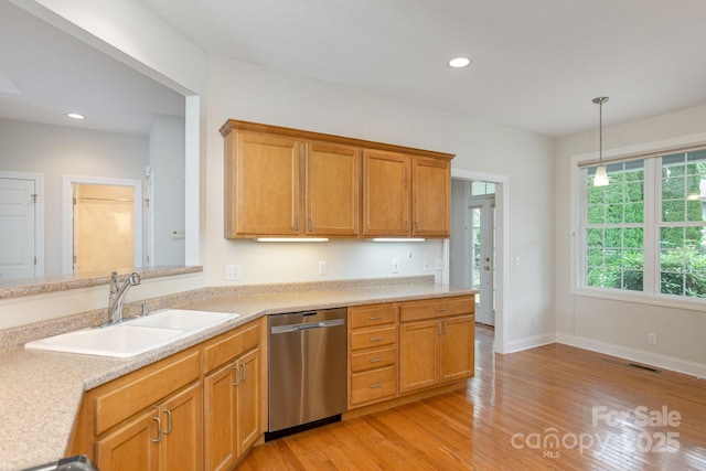 35 Stonecrest Ct, Flat Rock, NC 28731 - kitchen with dishwasher, light countertops, light wood-style floors, hanging light fixtures, and recessed lighting