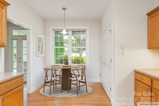 35 Stonecrest Ct, Flat Rock, NC 28731 - dining space with light wood-style floors and healthy amount of natural light
