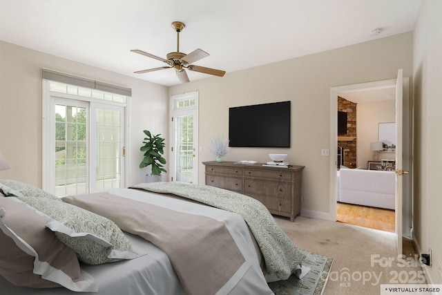 35 Stonecrest Ct, Flat Rock, NC 28731 - bedroom with access to exterior, light carpet, and a ceiling fan