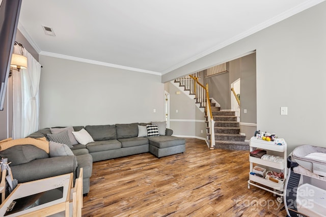 1045 Fairway Ridge Rd NW, Concord, NC 28027 - living area with stairs, crown molding, and wood finished floors