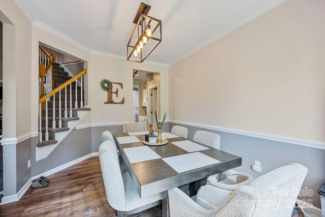 1045 Fairway Ridge Rd NW, Concord, NC 28027 - dining area featuring stairway, wood finished floors, and crown molding